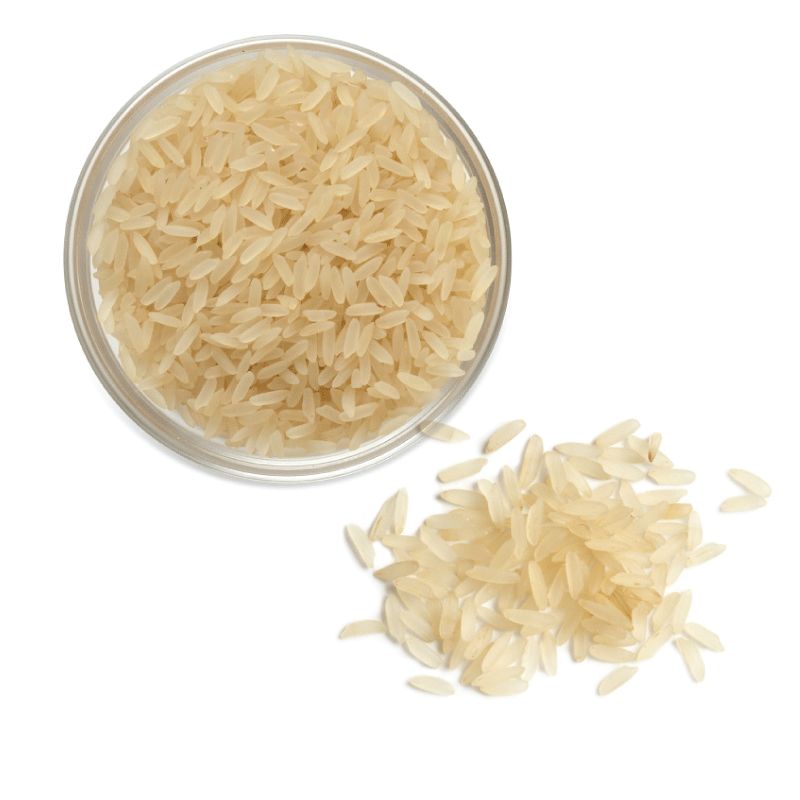 Overhead view of uncooked parboiled rice.