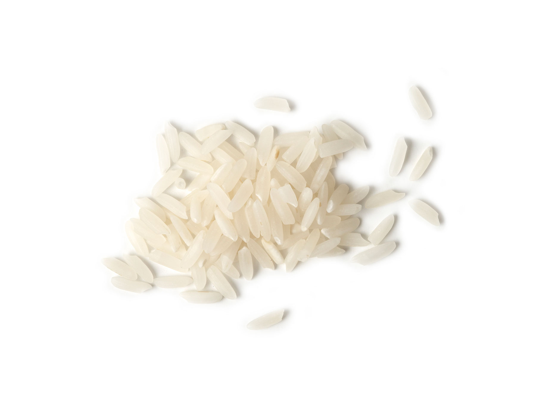 Overhead view of uncooked white rice grains.