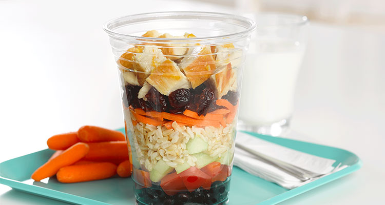 Side view of Cranberry Rice Shaker Salad on a lunch tray.