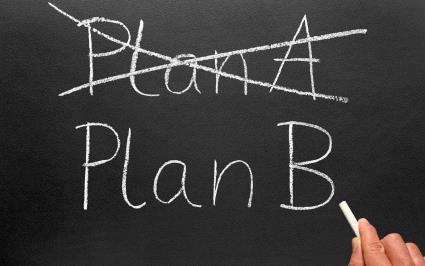 Plan A (crossed out) and Plan B written on chalkboard