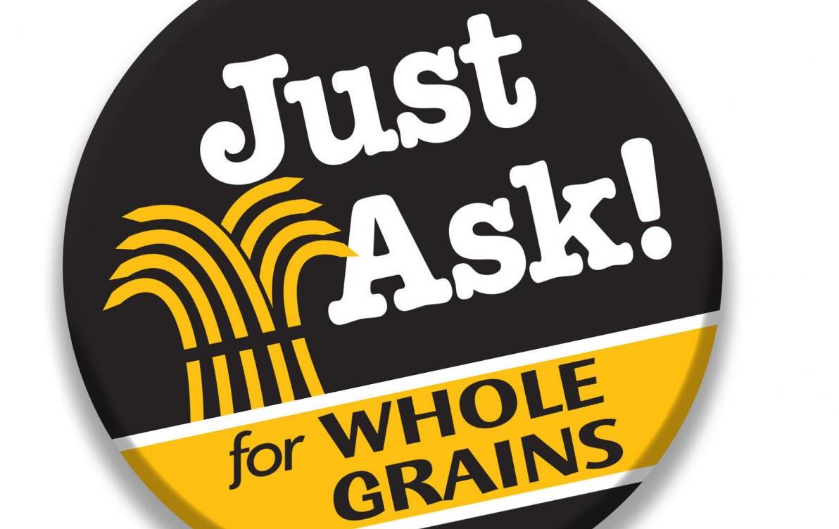 Black button with text "Just Ask for Whole Grains" and golden sheath of grains