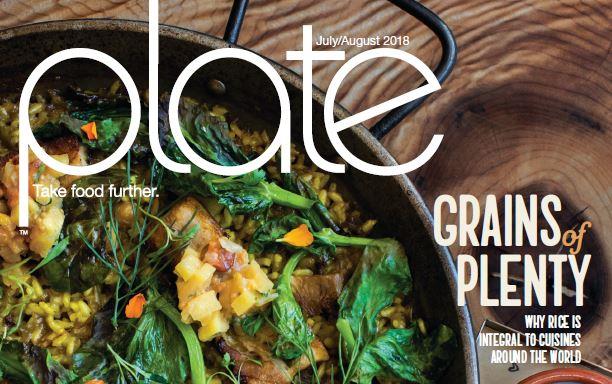 Magazine cover photo shows overhead shot of rice and vegetable dish in black bowl with a scorched lemon half and yellow peppers alongside