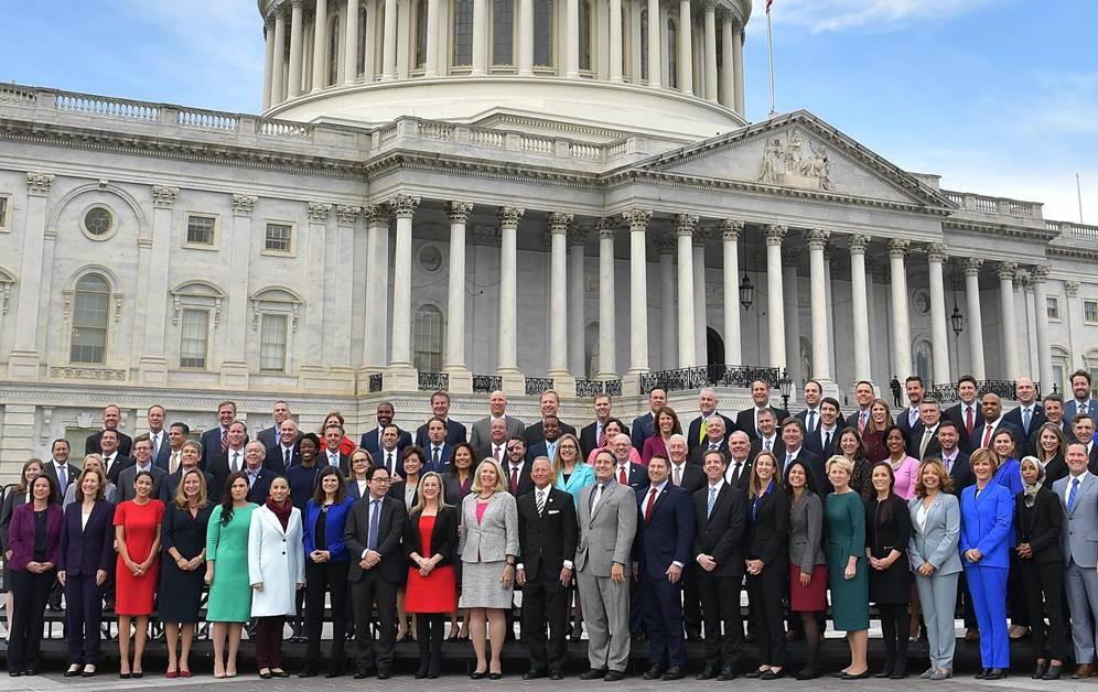 Group shot of 116th Congress Freshman Class standing on the Capitol steps