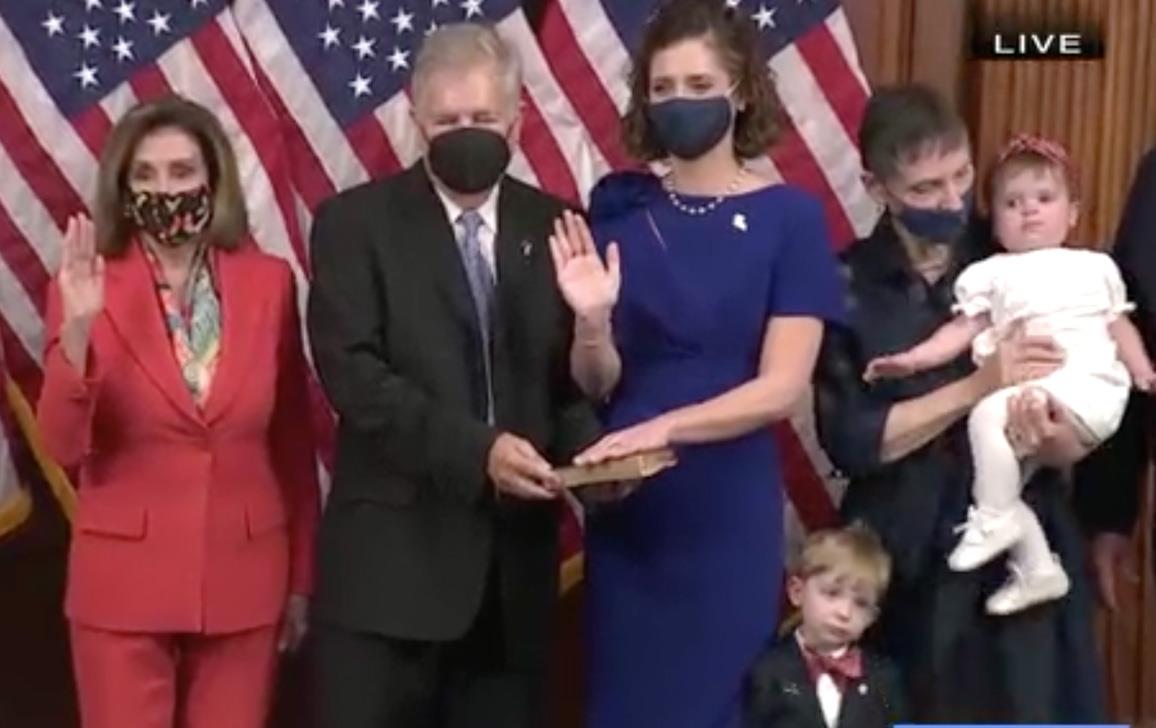 Julia-Letlow-Swearing-In-with children in front of American flags