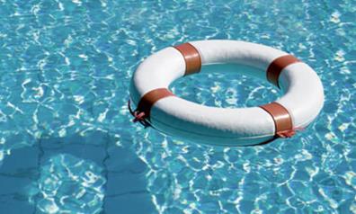 Life preserver floating in water