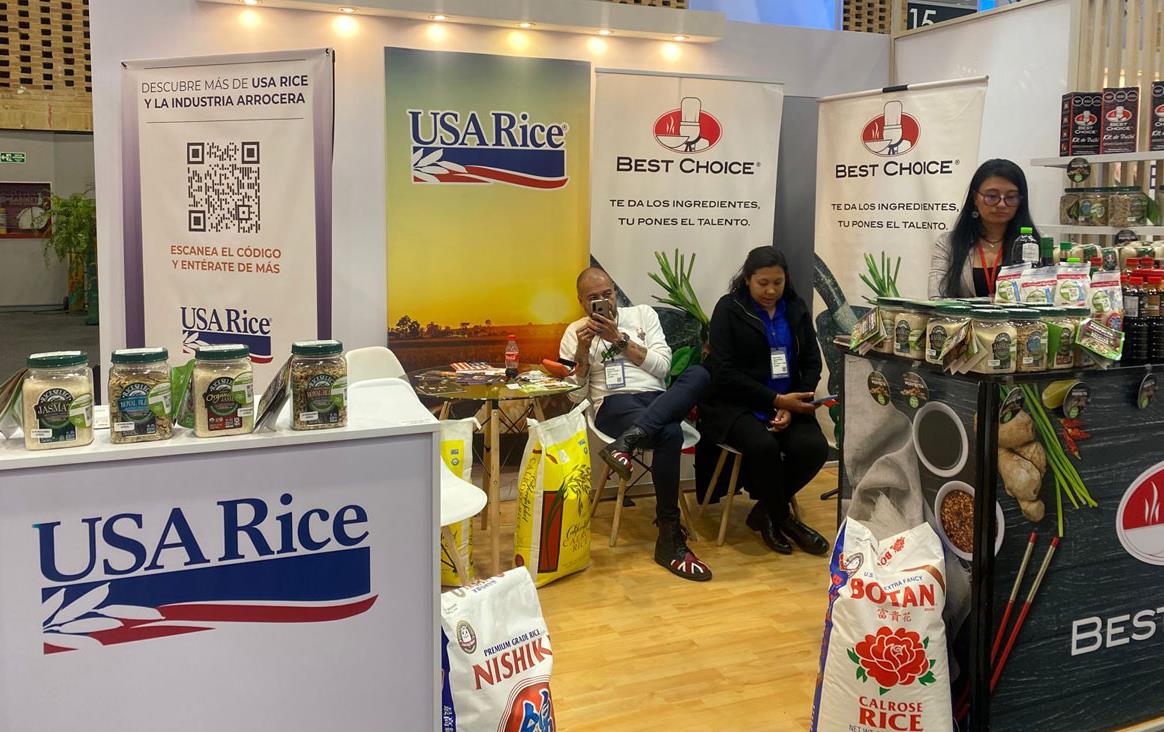 12th-Alimentec-Trade-Show, USA booth with staff, posters, and rice samples