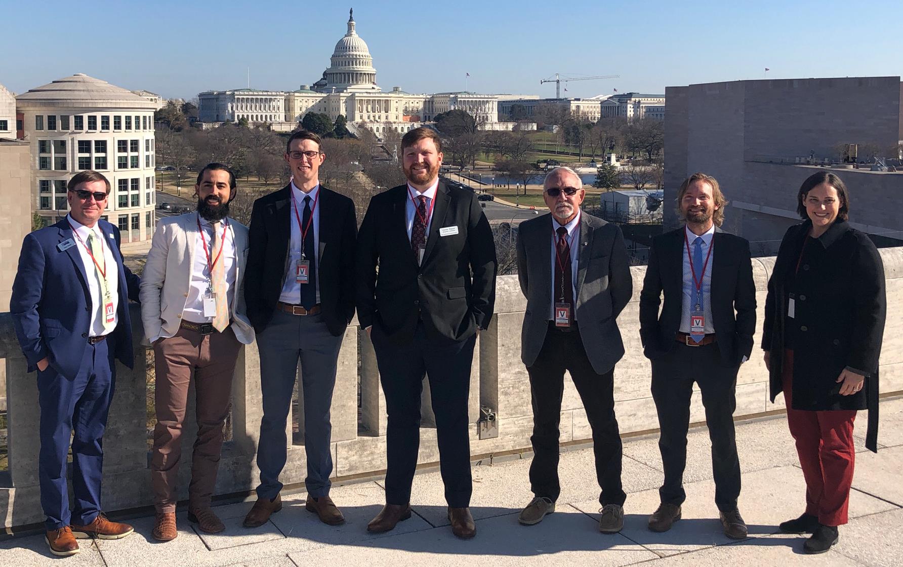 2022-24 Rice Leadership Class on the roof at Canadian Embassy, US Capitol dome in background