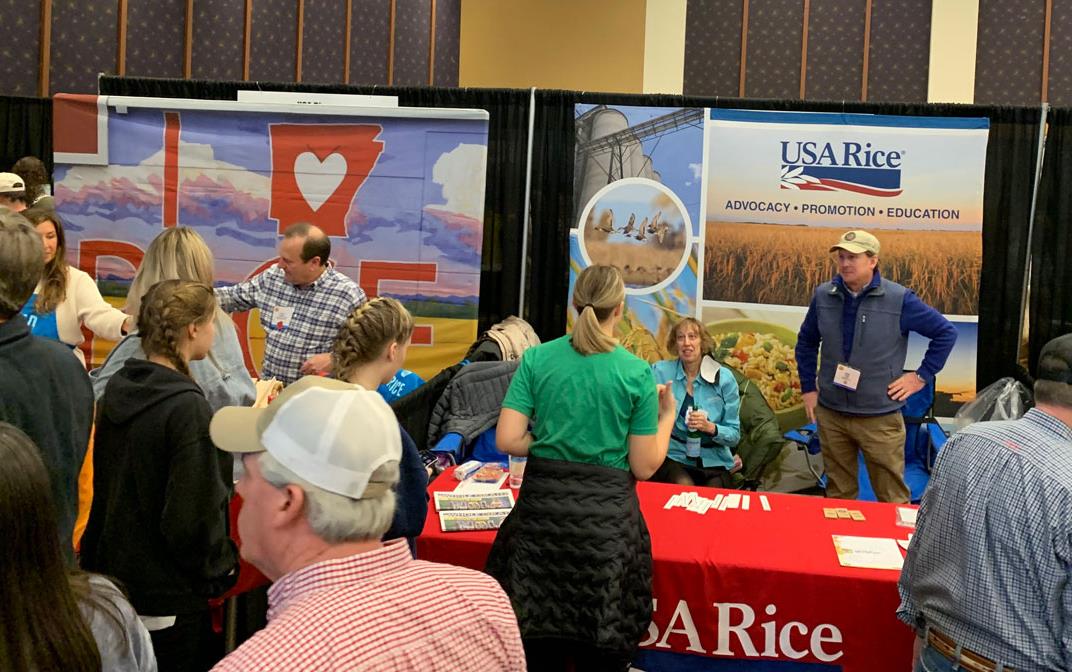 Trade show booths in a crowded exhibit hall