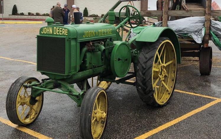  Antique John Deere tractor parked outside El Campo Museum of Natural History